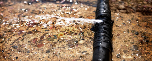 Leaking Hose Spraying Water on Sidewalk Leak Leaks Spray