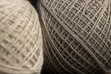 close-up of a ball of light-colored thread for needlework