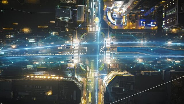 Dynamic hyper lapse of a busy city intersection at night with digital overlays, highlighting urban activity and traffic patterns