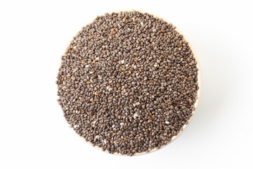 Chia seeds in bowl on white background. Top view