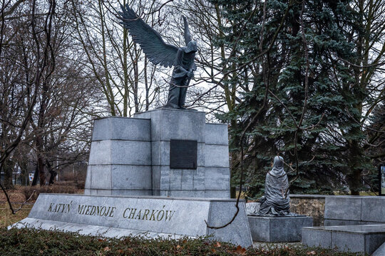 Wroclaw, Poland - January 01 2022: A stone Monument to the Victims of Katyn Massacre, designed by a sculptor Tadeusz Tchorzewski. Gray winter day, no people. 