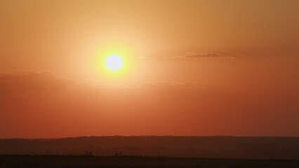 End of day, sun goes below horizon. Nature beautiful light sunrise sky colorful clouds scenery sky. Timelapse.