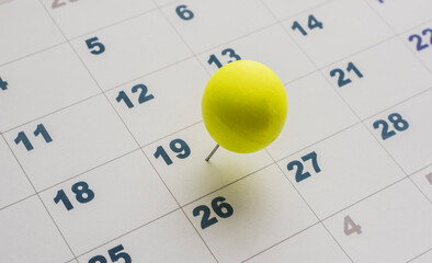 nineteenth day of the month on the calendar marked with yellow pin