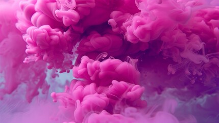 Fototapeta premium Vibrant pink ink cloud explosion in water