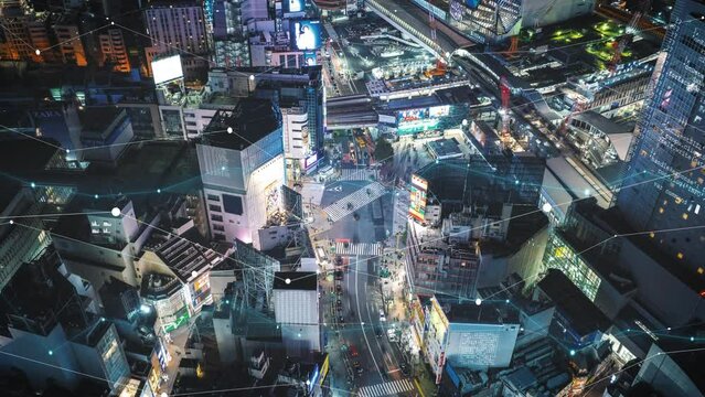 Metropolis bustling cityscape at night with futuristic digital overlays, highlighting a high tech urban environment with data analytics and information displays