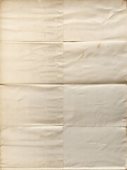 A vintage paper, folded with visible crease lines and age-related stains, suitable for backgrounds.