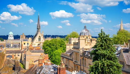 Top cityscape view of the city of Oxford with historical traditional architecture, bell towers and...