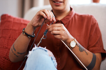 Hands, woman and knitting in living room for relax, hobby and creativity in home for fashion....