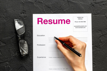 We are hiring. Employee filling resume files. Or HR manager reviewing resume applications