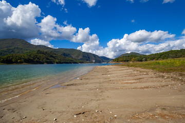 Lago Del Salto, in Lazio region (Italy),  reflects the sky and greenery
