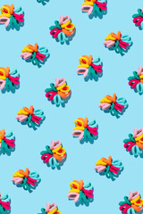 Fototapeta premium Abstract composition made of colourful hair bands on bright background.