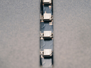 a closeup shot of a black metal tape isolated on a white background