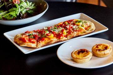 Breakfast Savory Flatbread Plated at Restaurant Table