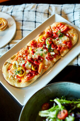 Breakfast Savory Flatbread Plated at Restaurant Table