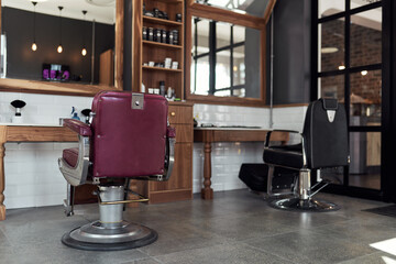 Barber, shop and chair with mirror in business for hair care, grooming and beauty. Professional,...