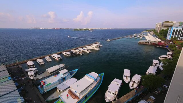 Male, Maldives - 15th april, 2024: yachts and boats in harbor motion timelapse in Maldives coastline