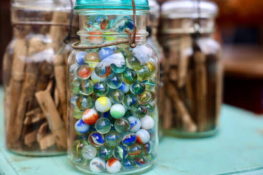 glass jar with antique marbles