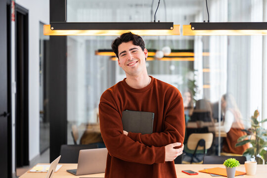 Confident professional in a modern workspace