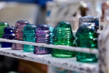 brightly colored antique glass insulators