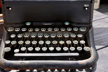 old typewriter on a wooden table