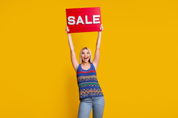 Photo of young blonde charming girl with sale placard shopaholic celebrate black friday starting...