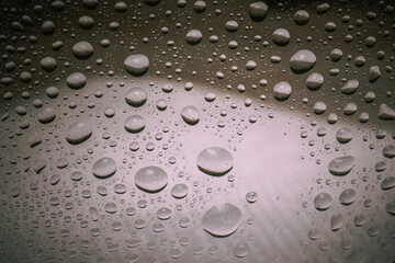 a selective focus shot of a red christmas ball with a blurred background