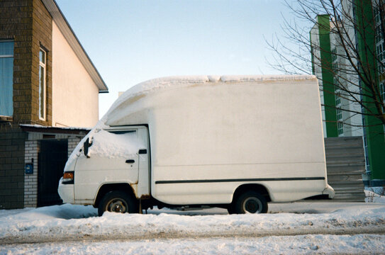 White van on snowy road