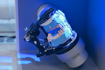 Scanning a denture in a dental laboratory.