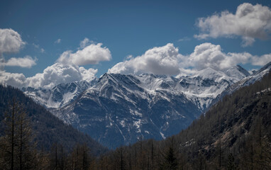 Fototapeta premium Spring hills under Simplonpass with blue sky in sunny day