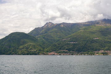 mountains surrounding lake como italy