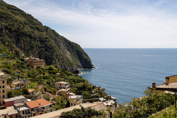 view of riomaggiore in italy from the coast