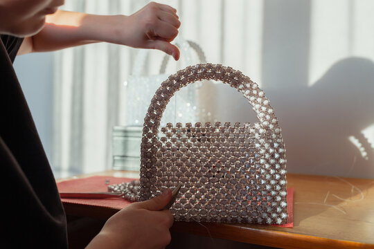 Crafting beads handmade handbag. Artisan handicraft and Hobby