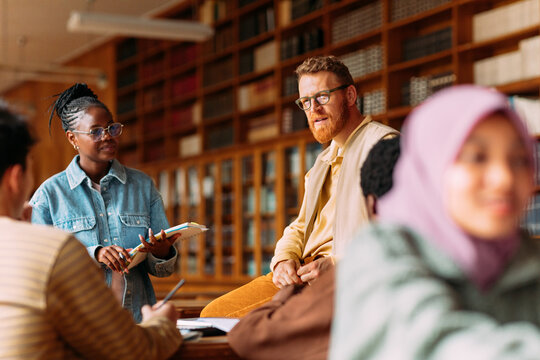 Professor talking to students