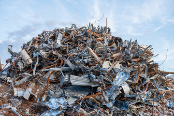 scrap metal on a construction site, collected for recycling