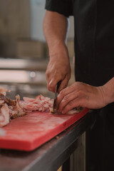 butcher cutting meat