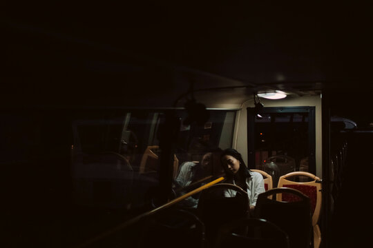 young girl is sleeping in the bus