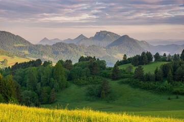 Mountain pass in Pieniny in Poland. Beautiful, dynamic and hazy sky over the mountains. Slovakia and Poland countryside.Mountain hiking, healthy lifestyle. Spring Poland.