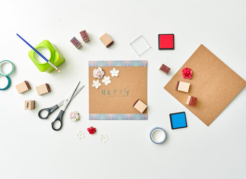DIY greeting cards being made o crafting table