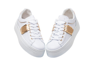 White sneaker isolated. Close-up of a pair white elegant stylish female leather high-heeled sport...