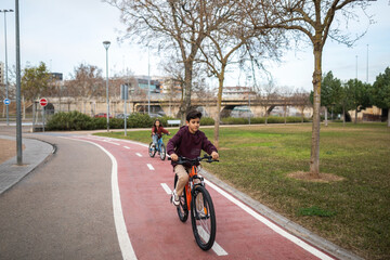 children riding bikes outdoors