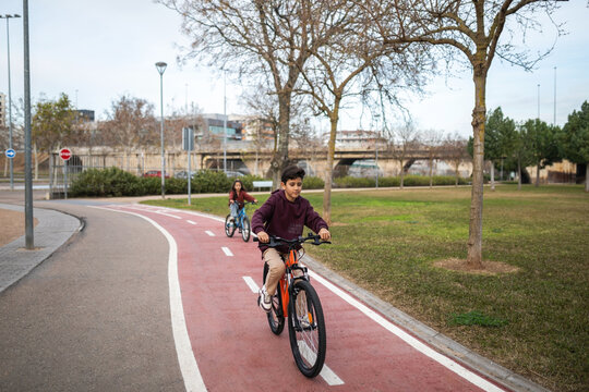 children riding bikes outdoors