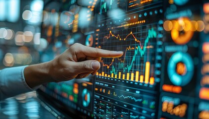 Hand pointing at financial data on a digital screen