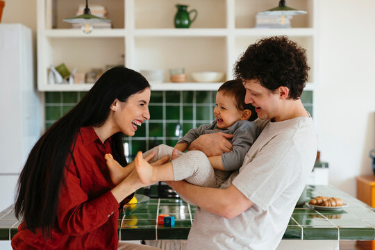 Family spending leisure time together at home