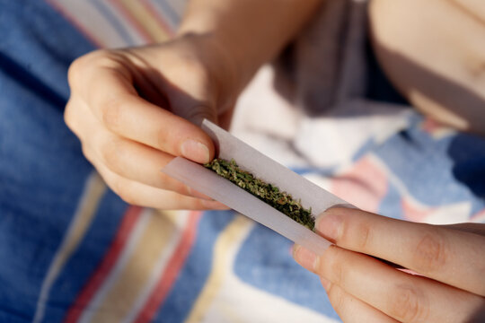 Rolling a marijuana joint