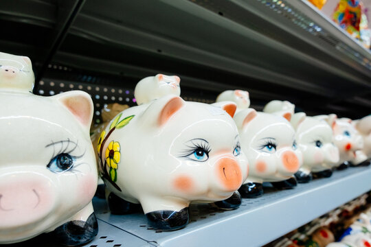 Row of Piggy Banks on Store Shelf