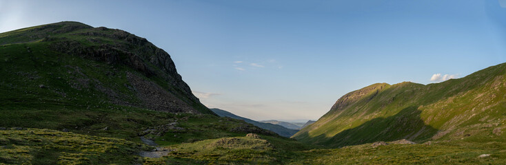 Panorama with lake, reflection and mountains