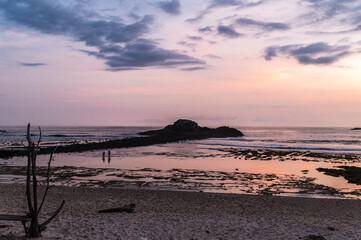 Surfers Returning from Surf Session