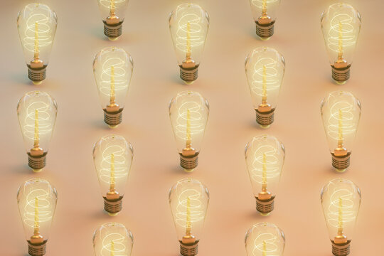 Matrix of Illuminated Edison Light Bulbs on Soft Gradient