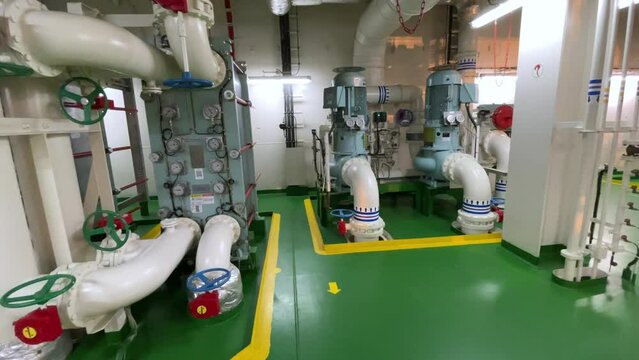 Industrial valves, pipes in modern offshore ship's engine room