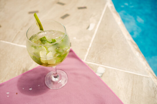 fresh lemon cocktail by the pool